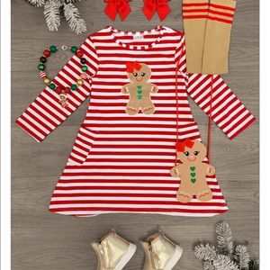 This is a red striped gingerbread dress that is a 10 to 12year old